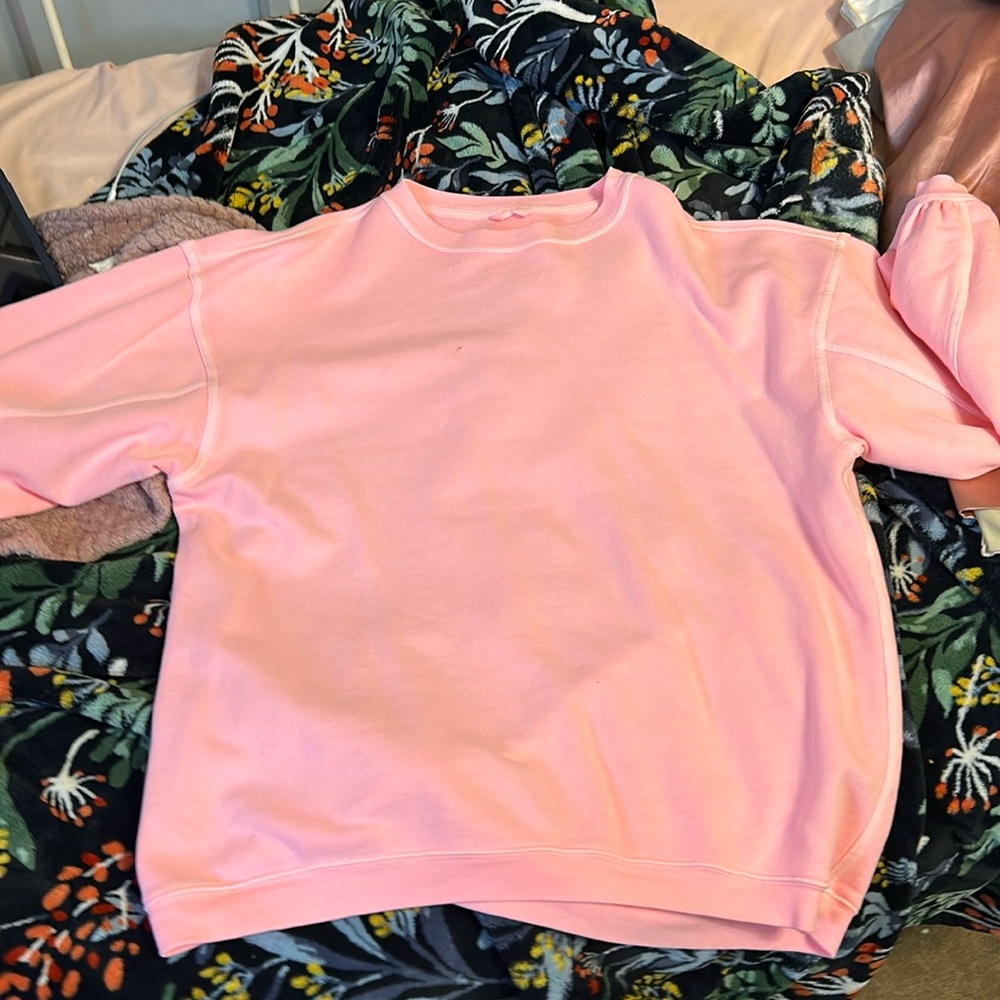 pinkish sweater